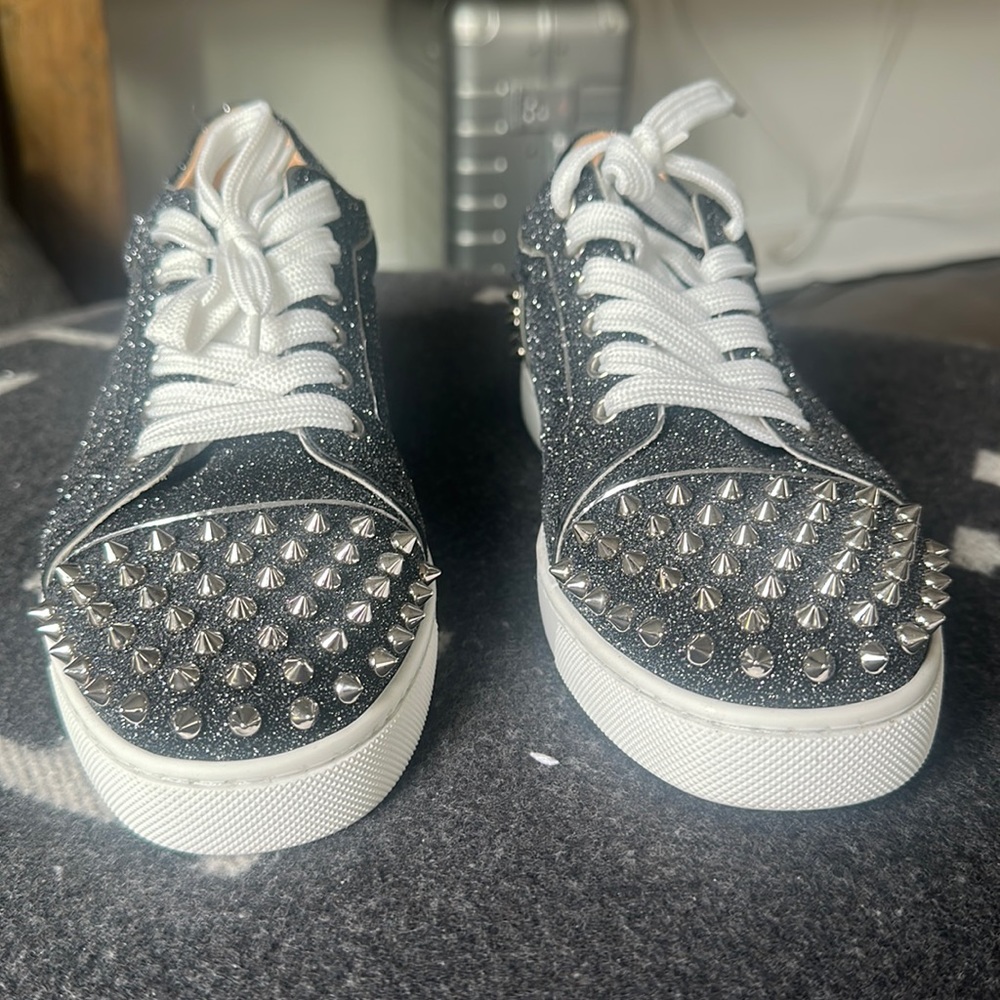 Christian Louboutin studded sneakers. Size 9 women’s. Worn once.
